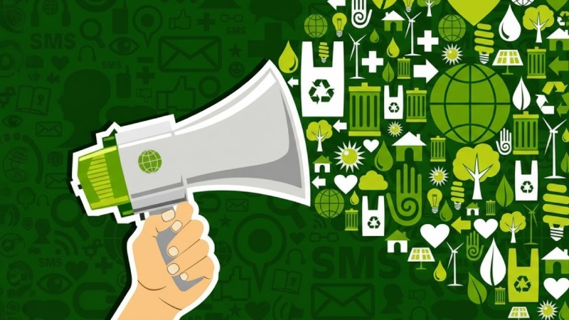 Blog Ambiental • Comunicação ambiental representada por megafone verde cercado por símbolos de sustentabilidade